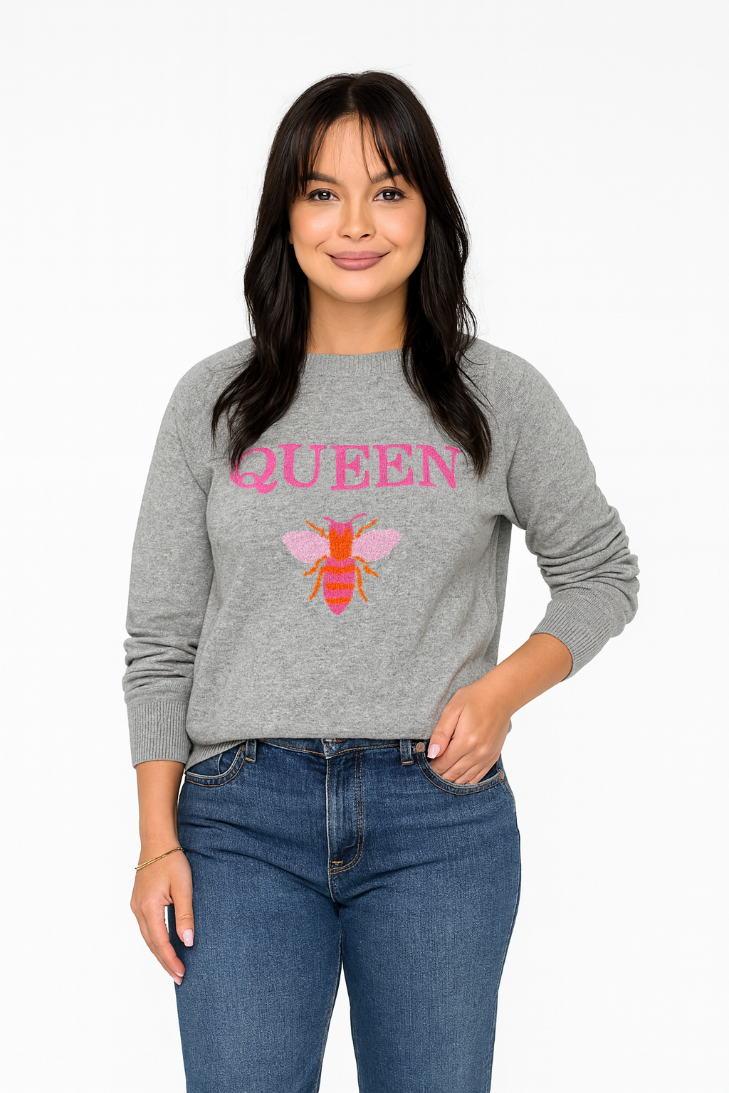 Woman wearing a gray sweatshirt with 'QUEEN' and a bee graphic on a white background
