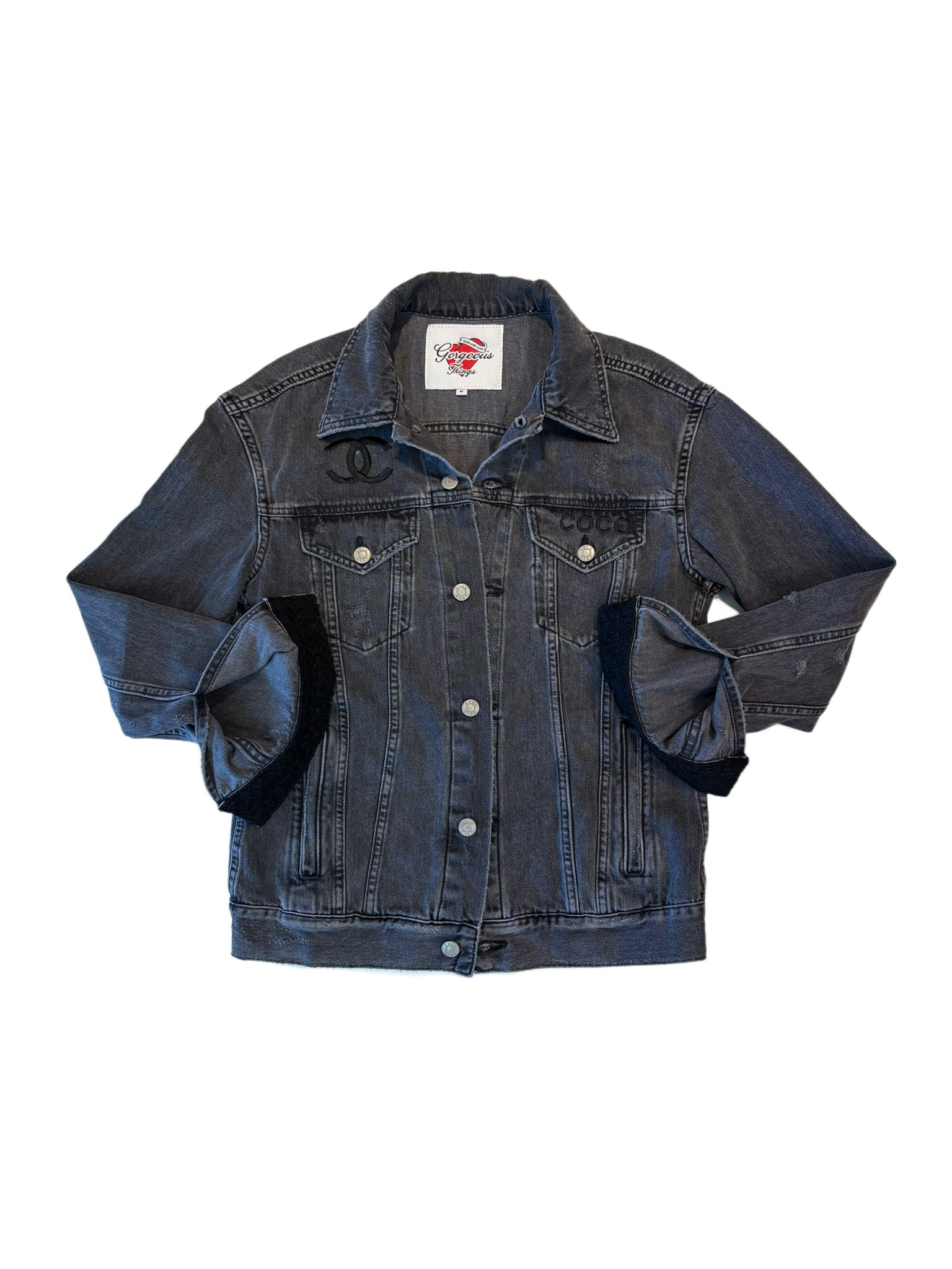 Denim dog coat with brand logo on a white background