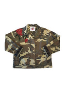 Camouflage jacket with patches on a white background