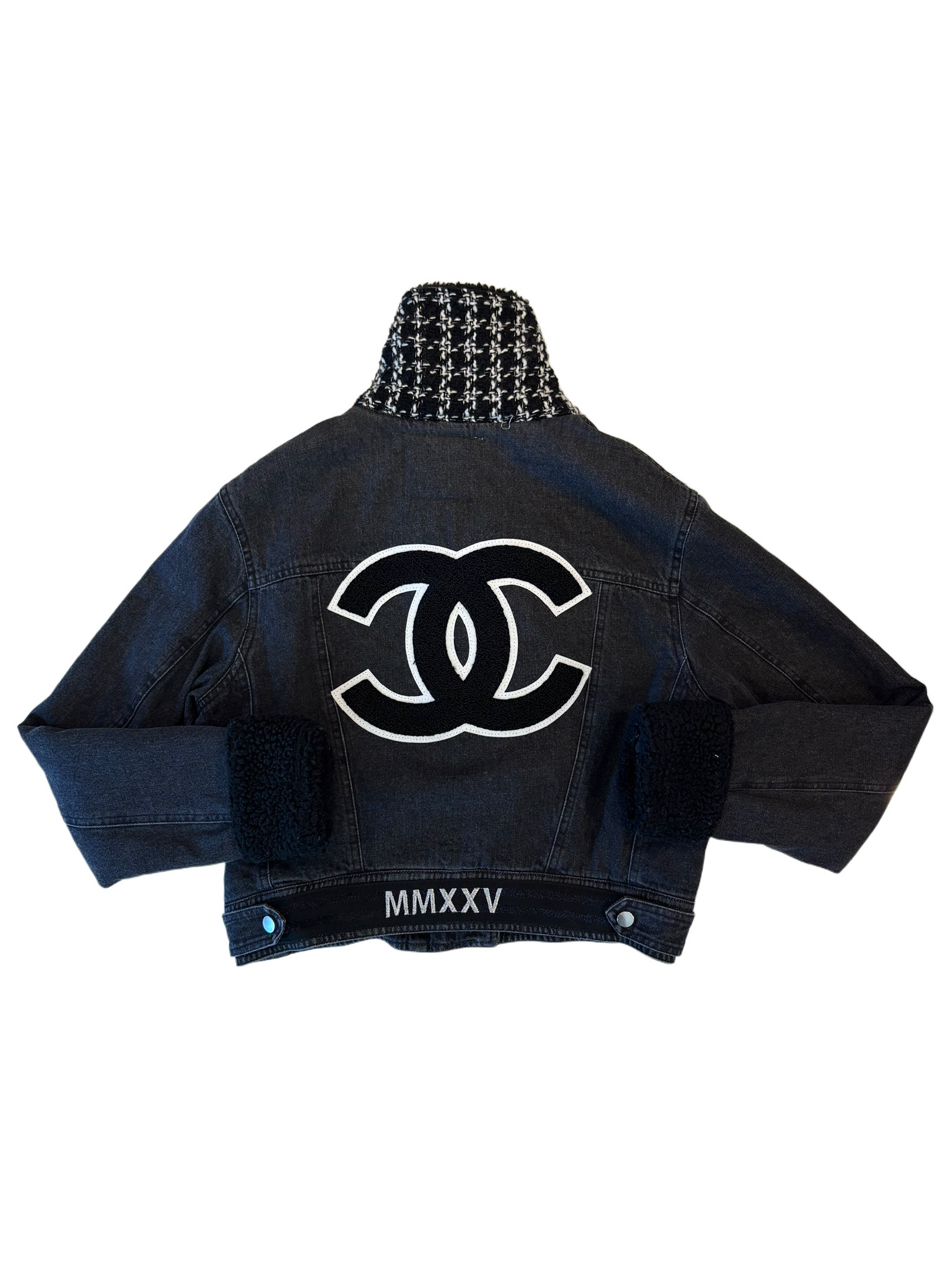 Black denim jacket with a white logo on a white background